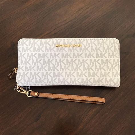 michael kors medium zip around wallet in signature monogram vanilla|Michael Kors logo wallet.